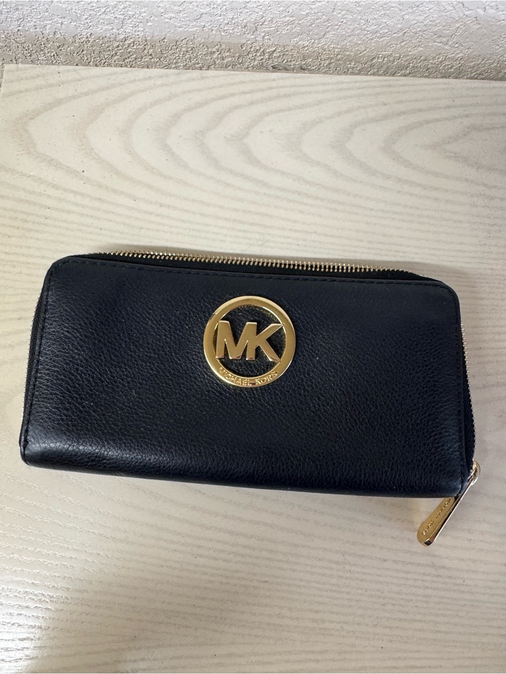 Michael Kors Black Leather Zip-Around Wallet with Gold MK Emblem